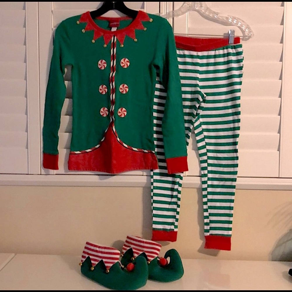 Elf outfit. Size is an XS adult (12-14kids) and the slippers are a 5-6
